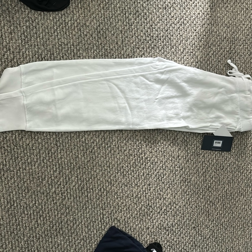 white cuffed sweatpants